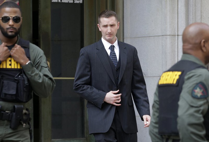 Officer Edward Nero, one of six Baltimore city police officers charged in connection to the death of Freddie Gray, leaves a courthouse after being acquitted of all charges in his trial in Baltimore, Monday, May 23, 2016. (AP Photo/Patrick Semansky)
