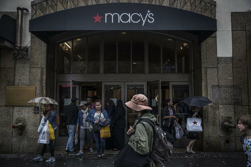 Shoppers exit a Macy’s Inc. store May 13 in the Brooklyn borough of New York City. Morgan Stanley analysts predicted that revenue at department stores will decline an average of 8.5 percent per year through 2020.