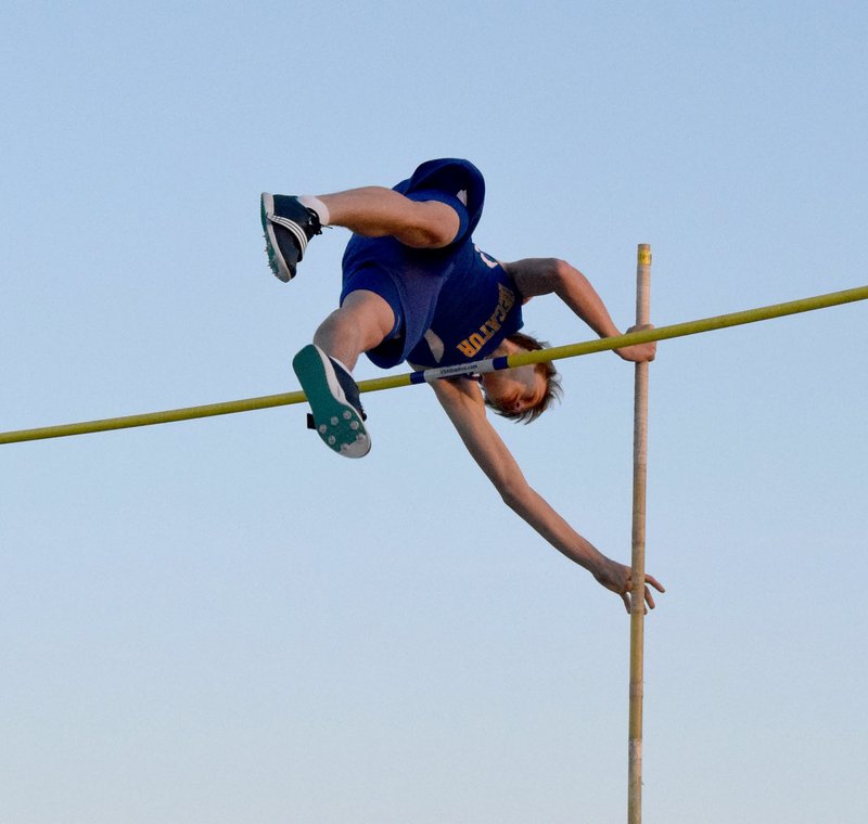 Photo by Mike Eckels Decatur&#8217;s Bracy Owens clears the bar at 11 feet, 8 inches, a personal best during the Tiger Relays in Bentonville March 17. Owens competed in the Arkansas Meet of Champions May 14 in Russellville were he placed 11th and set a new personal best of 13 feet.