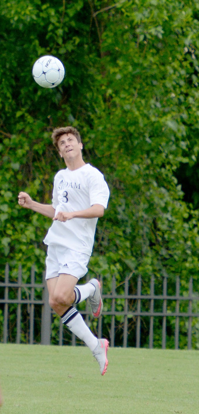 Bud Sullins/Special to the Herald-Leader Siloam Springs junior Austin Shull goes up for a header in the state championship game Friday against Russellville.