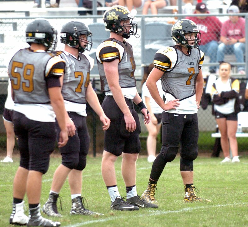 MIKE CAPSHAW ENTERPRISE-LEADER Prairie Grove defensive linemen, from left, Carl Simpson, Troy Sugg, Jack Stone and Sol Walker.