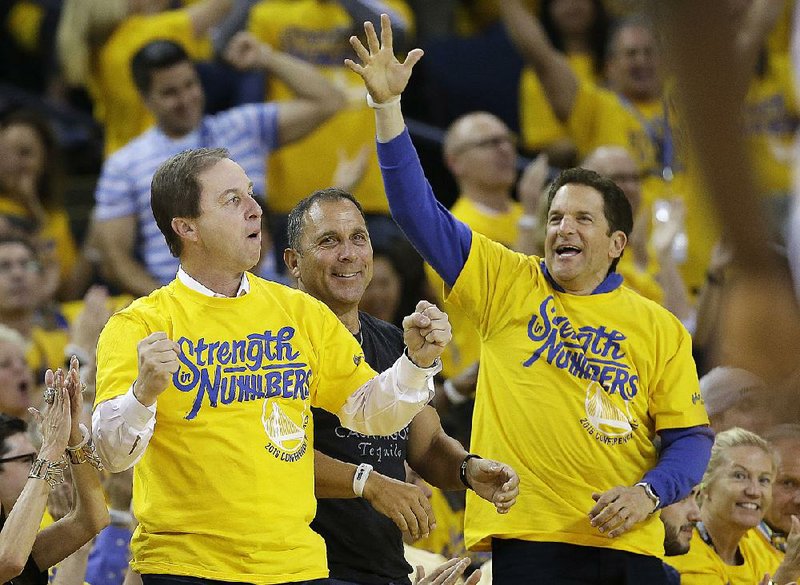 Golden State Warriors owner Joe Lacob (left) could have an interview from New York Times Magazine come back to haunt him. The Warriors trail the Oklahoma City Thunder 3-1 in the NBA Western Conference final.