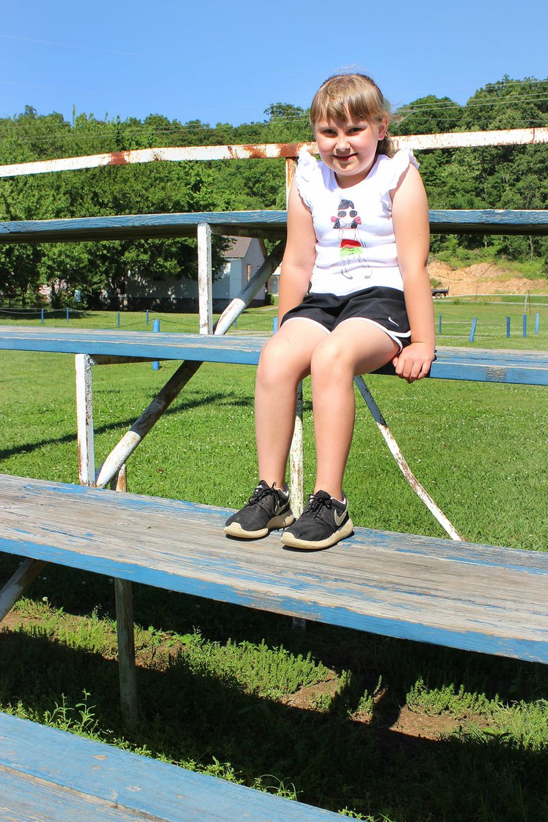 MEGAN DAVIS MCDONALD COUNTY PRESS After noticing the bleachers at Blankenship Park needed maintenance, 8-year-old Macy Reece took the initiative and raised funds to repair the weathered seats.