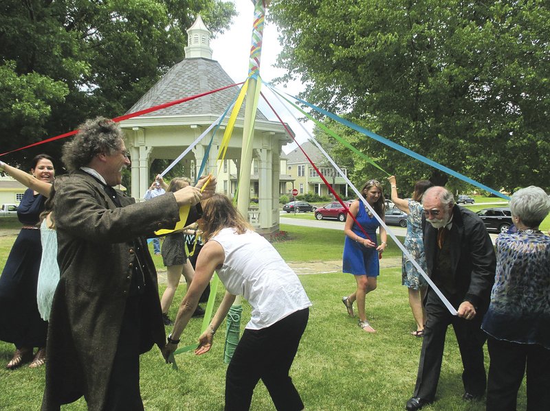 Visitors to the Clayton House in Fort Smith perform a maypole dance, a popular community activity in days gone by. The historic home and museum will celebrate Fort Smith's western heritage Saturday with a variety events, including a maypole dance.