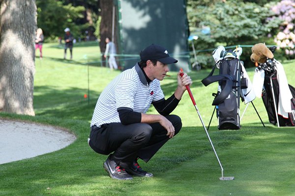 Kolton Crawford of Arkansas lines up a putt during the first round of the NCAA Golf Championships on Friday, May 27, 2016, at Eugene Country Club in Eugene, Ore. 