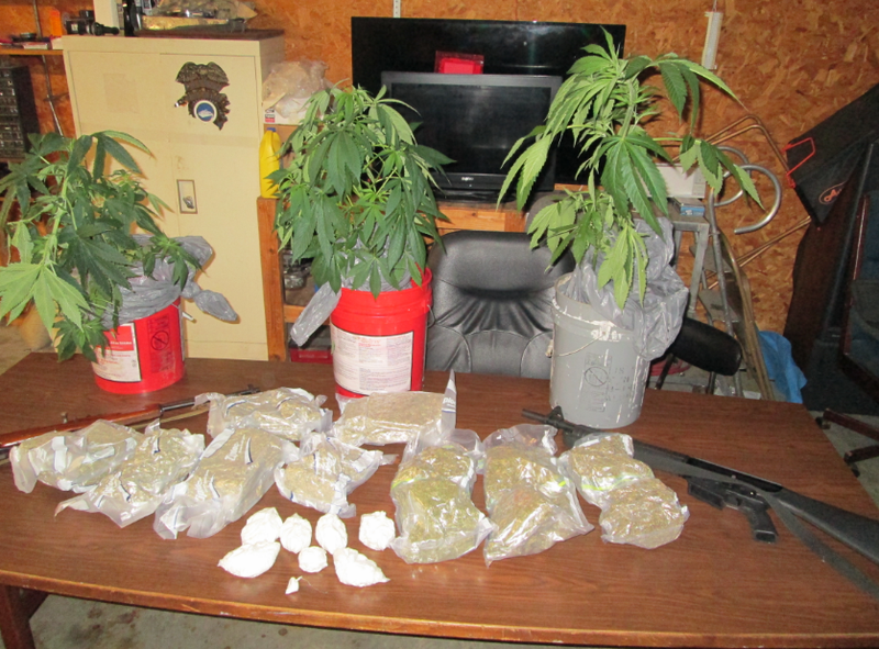Police seized 30 pounds of marijuana, 2 pounds of cocaine and two guns Thursday during a drug bust in Pine Bluff.  