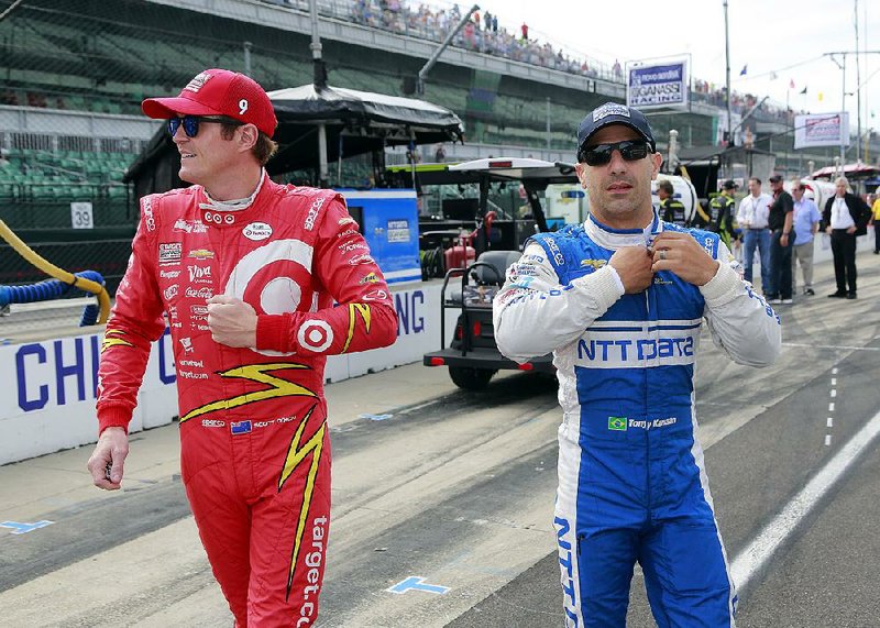 Tony Kanaan, left, spent Friday’s final practice before the Indianapolis 500 talking to the race track. “I’m trying to massage the track a little bit, talk to her nicely and then see if she will pick me [to win] on Sunday,” Kanaan said. Also shown is Scott Dixon, right, of New Zealand.