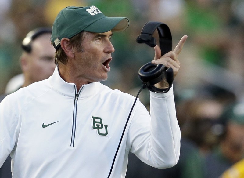 In this Sept. 12, 2015, file photo, Baylor coach Art Briles yells from the sideline during the first half of an NCAA college football game against Lamar in Waco, Texas. 