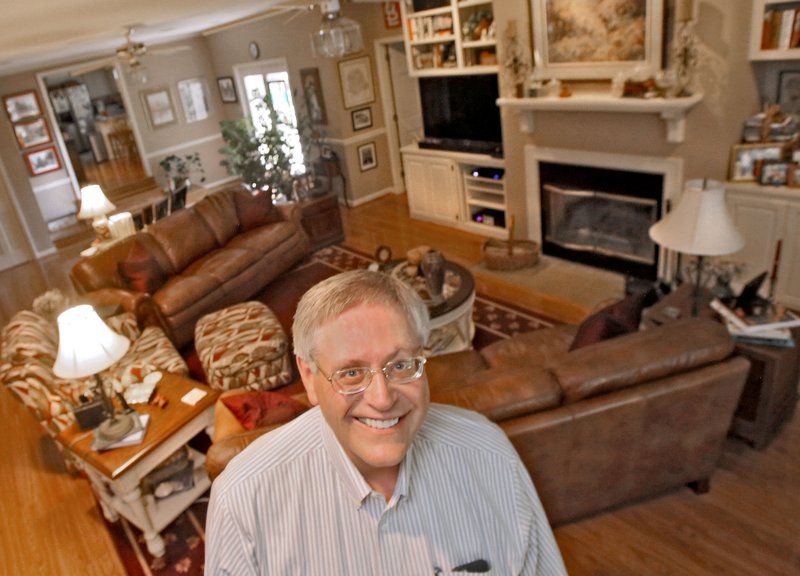 Jim Argue Jr. in seen in his den in this 2016 file photo. 