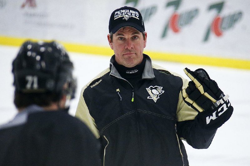 Pittsburgh Penguins head coach Mike Sullivan runs an NHL hockey practice at UPMC Lemieux Sports Center in Cranberry Township, Pa., Sunday May 15, 2016. 