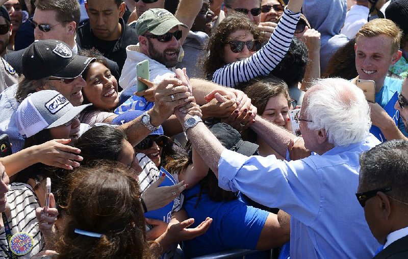 Democratic presidential candidate Bernie Sanders greets supporters Saturday after speaking in Santa Maria, Calif. 
