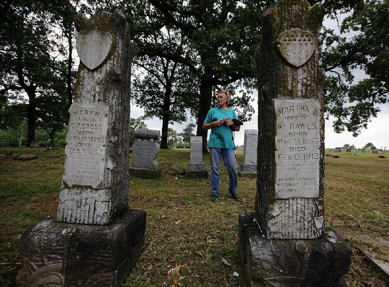 Kristal Clark talks Wednesday about some of the people buried in Thomas Cemetery, established in 1880 in North Little Rock’s Levy area.