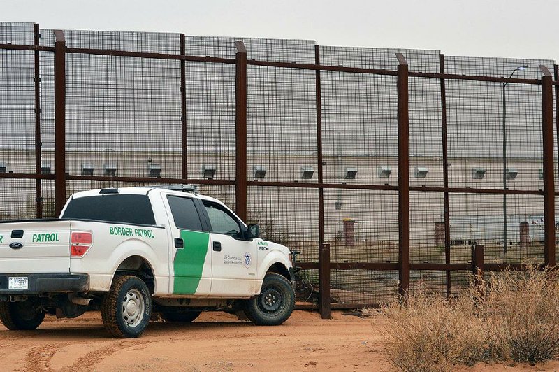 A U.S. Border Patrol vehicle patrols the border in the booming New Mexico community of Santa Teresa earlier this year.