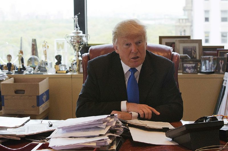 In this May 10, 2016 file photo, Republican presidential candidate Donald Trump speaks during an interview with The Associated Press in his office at Trump Tower in New York. 