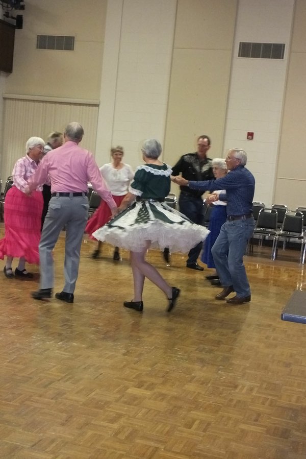 Square dancers keep twirling