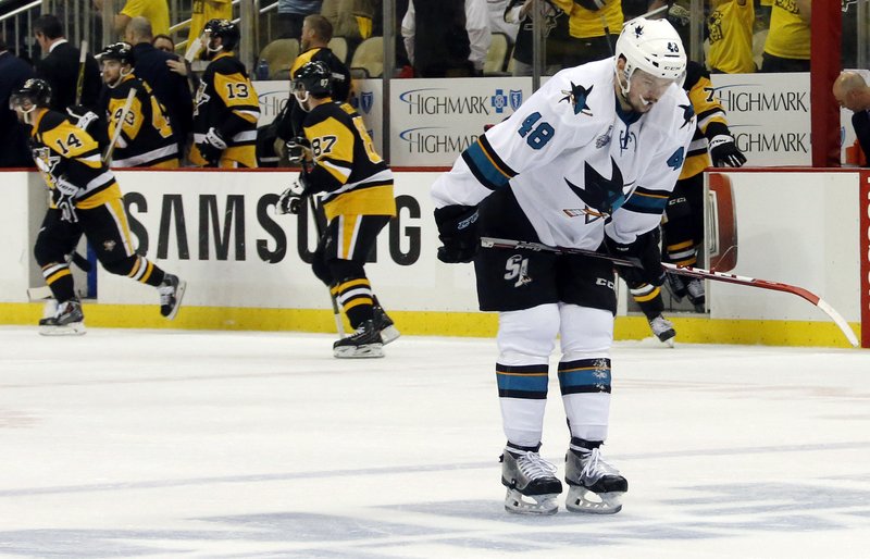 San Jose Sharks' Tomas Hertl, right, skates off the ice after the Pittsburgh Penguins defeated the Sharks 3-2 in Game 1 of the Stanley Cup final series Monday, May 30, 2016, in Pittsburgh. 