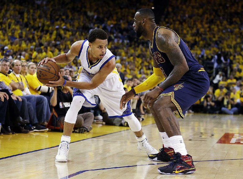 Finals attention on James, Curry | Northwest Arkansas Democrat-Gazette