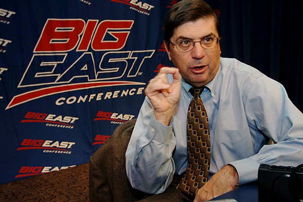 In this Oct. 26, 2005, file photo, Big East commissioner Mike Tranghese talks to reporters during Big East NCAA college basketball media day at Madison Square Garden in New York. The SEC is turning to former Big East Commissioner to help improve the league’s basketball profile and NCAA Tournament presence. SEC Commissioner Greg Sankey hired Tranghese as a "special advisor to the commissioner for men's basketball." (AP Photo/Henny Ray Abrams, File)