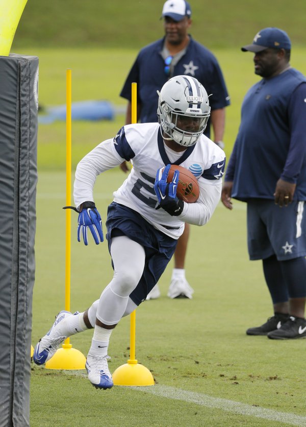 Elliott runs with Dallas starters, but nothing's set The Arkansas