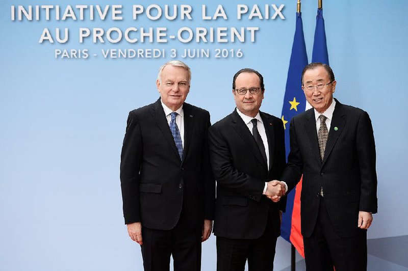 French Foreign Minister Jean-Marc Ayrault (left), French President Francois Hollande and United Nations Secretary-General Ban Ki-moon visit Friday in Paris before a meeting to revive Israeli-Palestinian peace talks. 