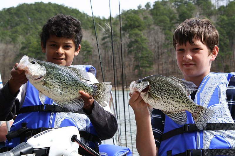 The post-spawn period is a great time to catch big crappie in Arkansas, like these slabs taken at Lake Greeson. Limits may be rare during post-spawn, but you can catch big fish. 