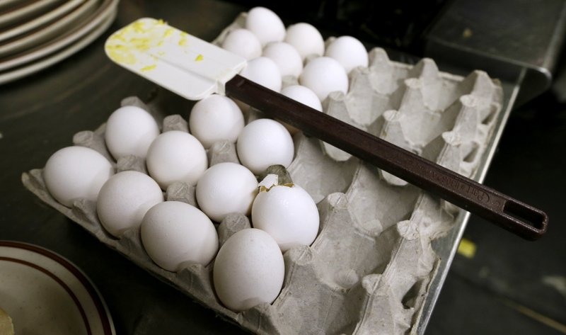  In this June 19, 2015, file photo, eggs wait to be cooked at a cafe in Des Moines, Iowa. 