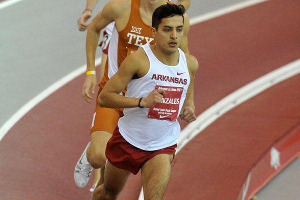 Arkansas runner Gabe Gonzalez competes in the men's 3,000-meter run during the Arkansas-Texas dual track meet Friday, Jan. 16, 2015, at the Randal Tyson Track Center in Fayetteville.