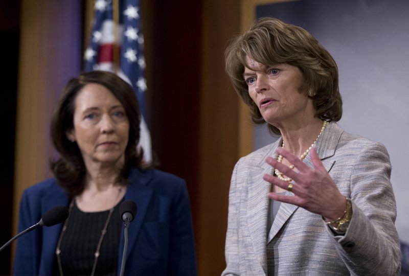 In this photo taken April 20, 2016, Senate Energy and Natural Resources Committee Chair Sen. Lisa Murkowski, R-Alaska, right, accompanied by the committee's ranking member, Sen. Maria Cantwell, D-Wash., speak about energy policy modernization during a news conference on Capitol Hill in Washington.