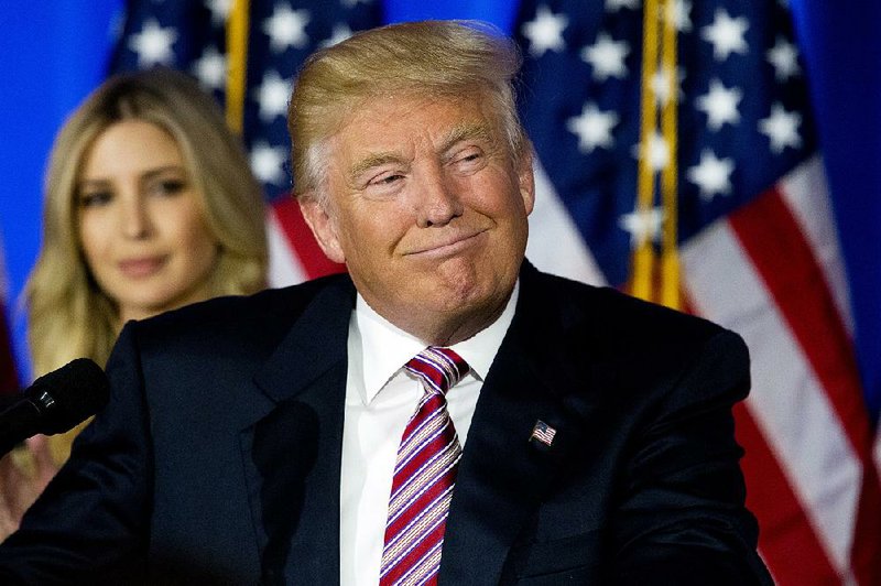 Donald Trump listens to supporters’ cheers Tuesday at Trump National Golf Club Westchester in Briarcliff Manor, N.Y.