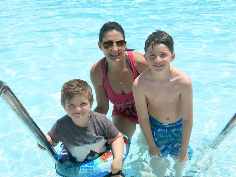 Photo by Susan Holland Cathie West, of Rogers, brought her grandsons Easton Ridpath, 5, of Rogers, and Hayden Arnold, 9, of Pea Ridge, to enjoy a dip in the Gravette city pool on Saturday. The three were visiting Cathie&#8217;s parents, Howard and Caryl West of Gravette, over the weekend.