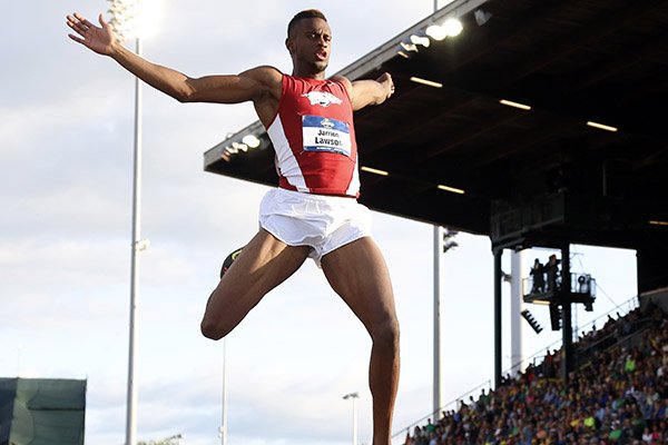 Arkansas' Jarrion Lawson leaps on his way to winning the long jump at the NCAA outdoor track and field championships in Eugene, Ore., Wednesday, June 8, 2016. (AP Photo/Ryan Kang)