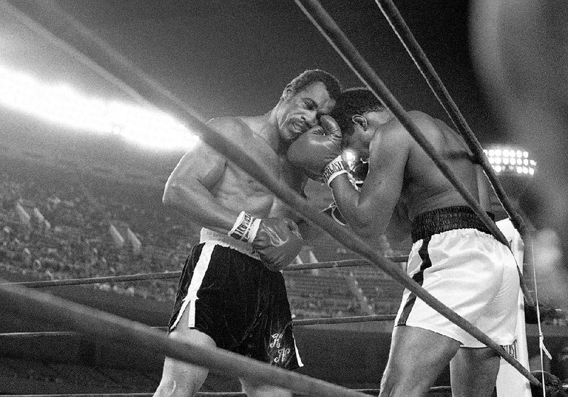 Ken Norton (left) defeated Muhammad Ali in their first meeting at San Diego in 1973, breaking Ali’s jaw in the process. The two met two more times, with Ali winning each. Norton’s son, Oakland Raiders defensive coordinator Ken Norton Jr., said the two later became close friends.
