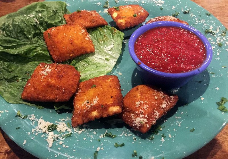 St. Louis Toasted Ravioli, served with marinara, is an appetizer at Grady’s Pizza and Subs.