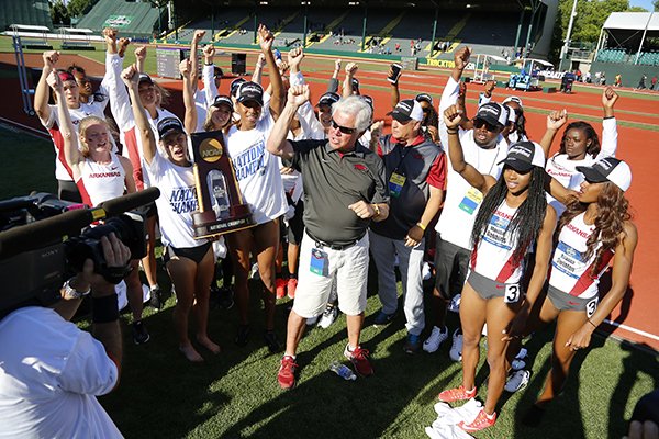 Arkansas celebrates winning the women's team title at the NCAA outdoor track and field championships in Eugene, Ore., Saturday, June 11, 2016. (AP Photo/Ryan Kang)