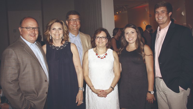 Bill and Vickie Mathews (from left), Greg Lancelot, Cathy Crouch and Madison Worley and Cody Lancelot help support Ronald McDonald Charities of Arkhoma at the Red Shoe Soiree.