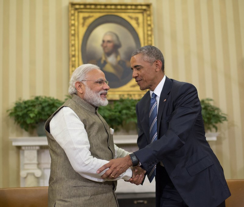 In this June 7, 2016, file photo, U.S. President Barack Obama and Indian Prime Minister India Narendra Modi shake hands before their meeting in the Oval Office of the White House in Washington. 