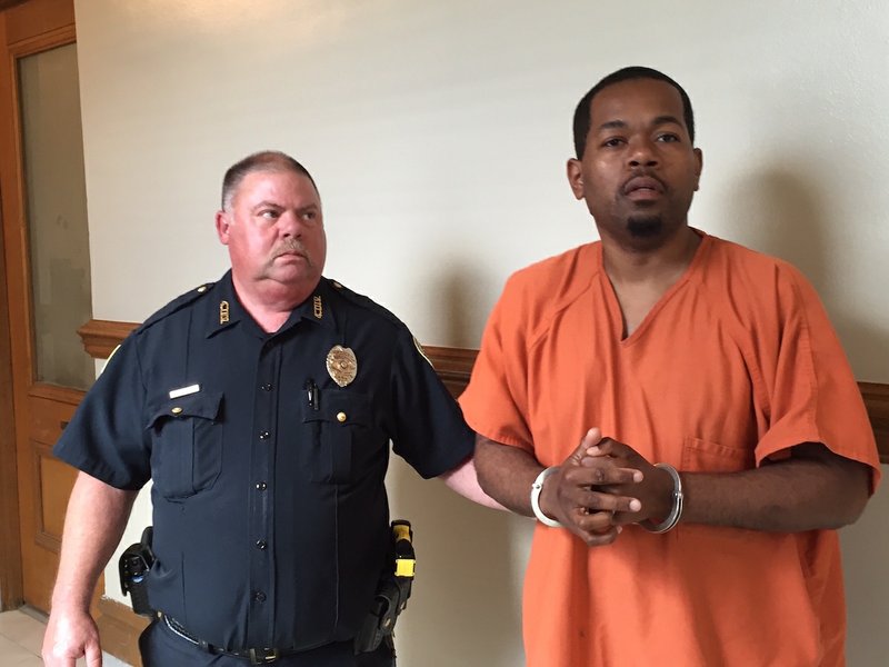 Little Rock restaurateur Quenton King, 37, of Scott leaves Pulaski County Circuit Court on Monday, June 13, 2016 after a pretrial hearing ahead of his capital murder trial.