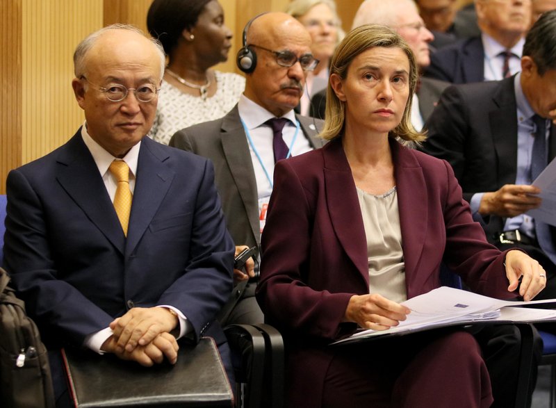 Director General of the International Atomic Energy Agency, IAEA, Yukiya Amano and EU foreign policy chief Federica Mogherini, from left, attend the 20th anniversary celebration of the Comprehensive Nuclear Test Ban Treaty Organization, CTBTO, at the UN headquarters in Vienna, Austria, Monday, June 13, 2016. 