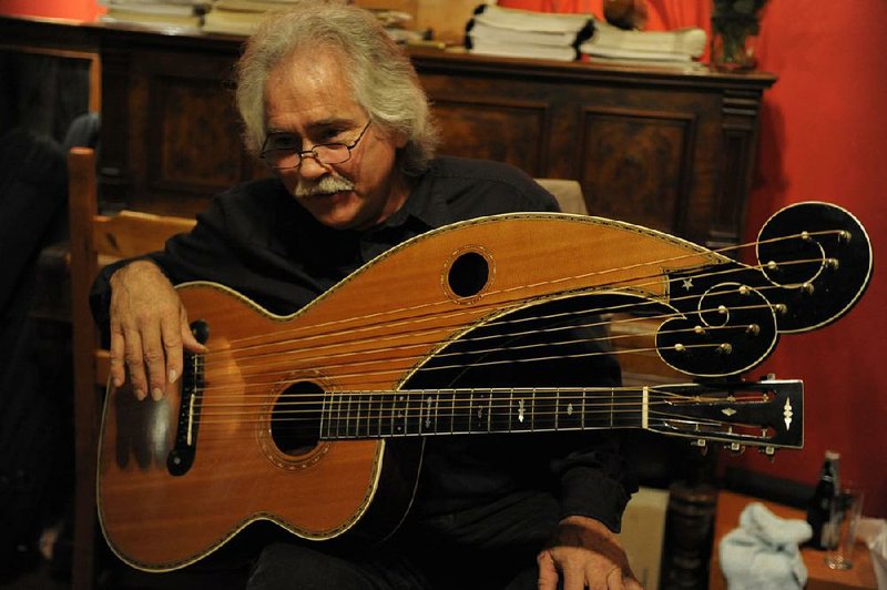 Stephen Bennett will play fingerstyle and harp guitar today at The Joint in North Little Rock’s Argenta Arts District.
