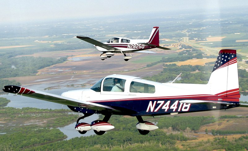 Members of the American Yankee Association fly their aircraft in formation. Nearly 45 Grumman aircraft will fly into Fayetteville next week for a national convention of Grumman owners and enthusiasts.