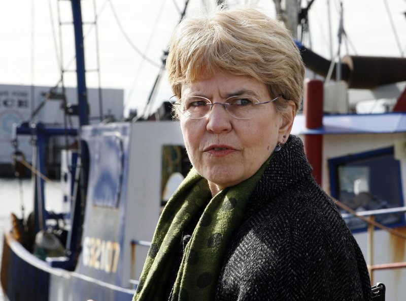 In this March 2, 2010 file photo, National Oceanic and Atmospheric Administration, NOAA, chief, Jane Lubchenco looks out from the waterfront as she speaks to fisherman in Gloucester, Mass. 