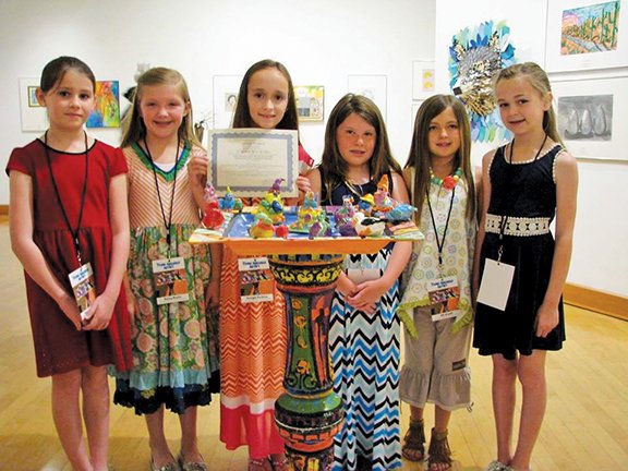 A group of students from the Smithzonian Art Center in Arkadelphia won a Best of Class award for a mixed-media piece, Happy Bird-Day! The students include Sara Stockslager, from left, Kelsey Boyles, Georgia Stockton, Lauren White, Alli Arnold and Allison Blakely.