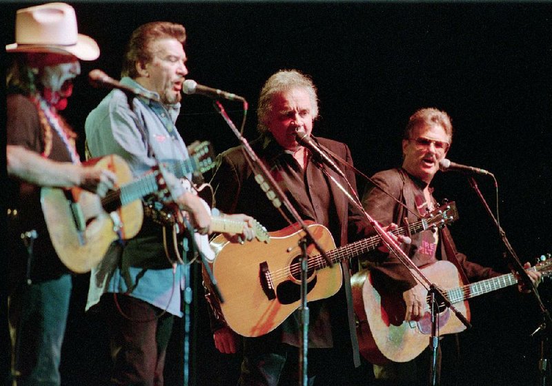 The Highwaymen — Willie Nelson (from left), Waylon Jennings, Johnny Cash and Kris Kristofferson — perform in 1995 at a Connecticut casino. A new CD and DVD boxed set celebrates the country supergroup.