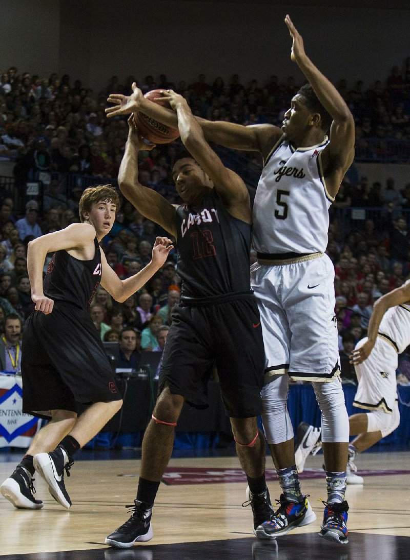 As the first man off the bench for Cabot’s boys basketball team, Jarrod Barnes (12) gave the team a lift. Coach Jerry Bridges, who started Barnes as a sophomore, said he’s more relaxed in his substitute role. 