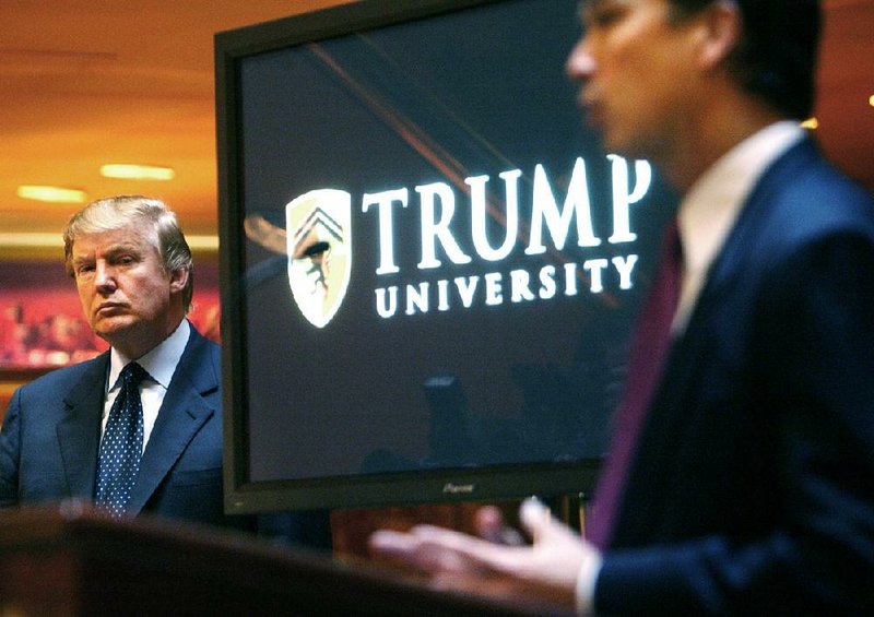 Donald Trump waits for an introduction at a May 23, 2005, news conference in New York to announce the establishing of Trump University.