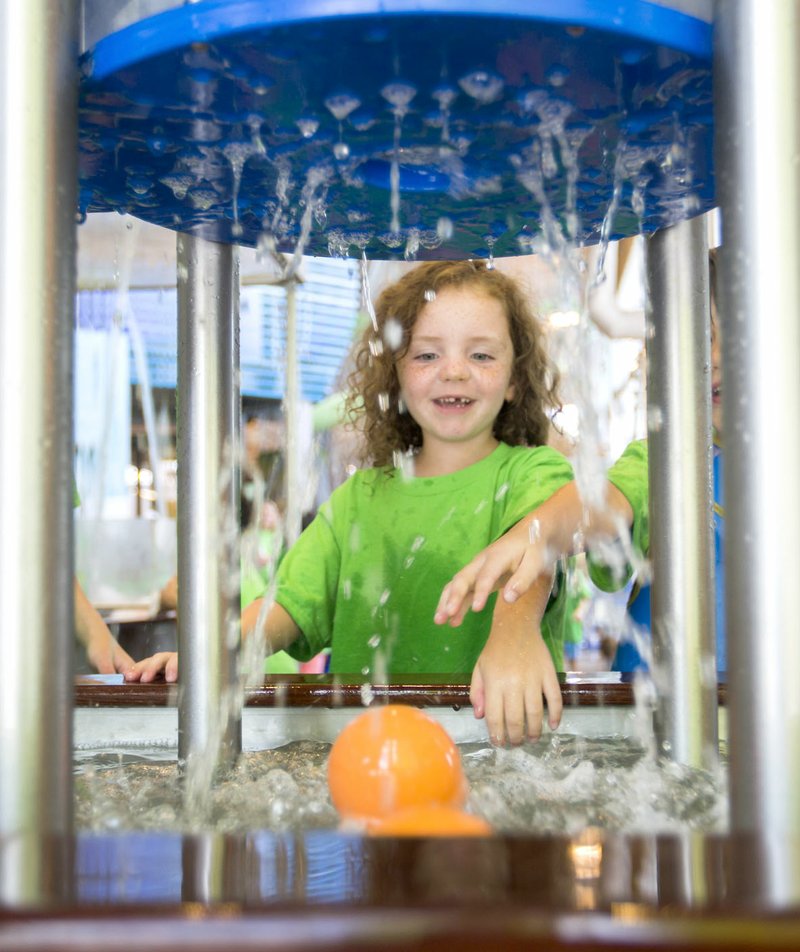 Isabel Treptow, 6, plays Friday at the Scott Family Amazeum in Bentonville. Isabel was at the museum with a group from Kindergrove Preschool & Childrens Center in Rogers.