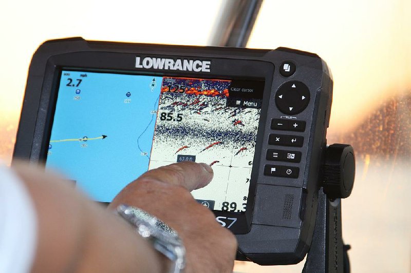 The author’s Eagle Fishmark 320 was an advanced graphics unit in the early 2000s, but modern electronic graphs (shown) allow anglers to identify individual fish, just like these stripers hanging out just below the thermocline on Lake Ouachita. 