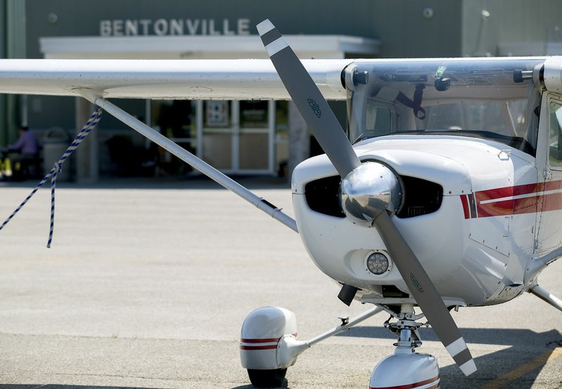 Parked airplanes sit on the tarmac Friday at the Bentonville Municipal Airport. Sheep Dog Impact Assistance is moving its annual event held the Saturday before Sept. 11 to Little Rock as there have been some complications with holding it at the Bentonville airport this year.