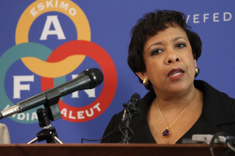 U.S. Attorney General Loretta Lynch addresses reporters following a meeting with Alaska Native leaders Friday, June 10, 2016, in Anchorage, Alaska. 