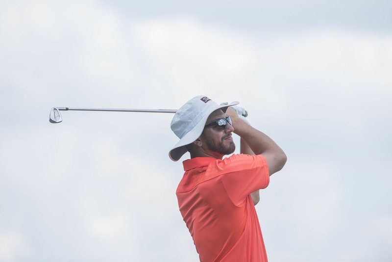 Brett Granata of Springdale watches a tee shot Sunday during the 78th annual Chick-A-Tee Golf Tournament at the Springdale Country Club. Granata shot 13 under par for 203 for the tournament with three under par score of 69 for the last round.